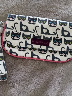 Bungalow 360 Cute Cat print cotton canvas wristlet with zip closure.